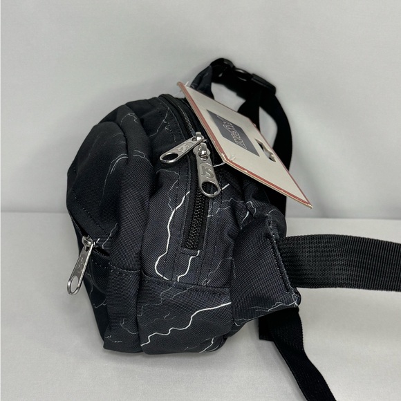 Jansport Fifth Avenue Electric Bolts cross body
Bag - Picture 5 of 10